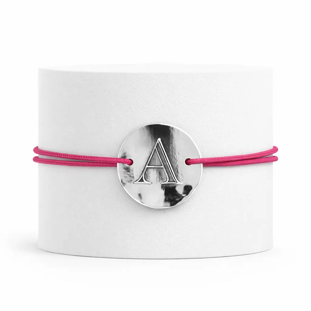 Bracelet initiale en titane personnalisé sur cordon Adrien Moniquet